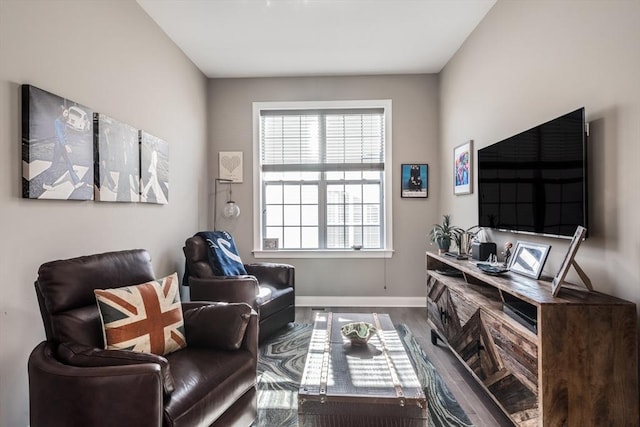 sitting room featuring wood finished floors and baseboards