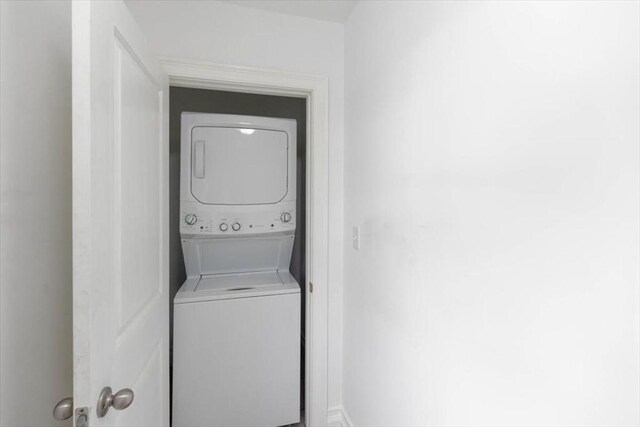 7 New Bridge St, Hingham, MA 02043 - washroom featuring stacked washing machine and dryer