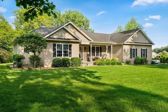 53 Gilbert Rd, Southampton, MA 01073 - ranch-style home with covered porch, a front yard, and roof with shingles
