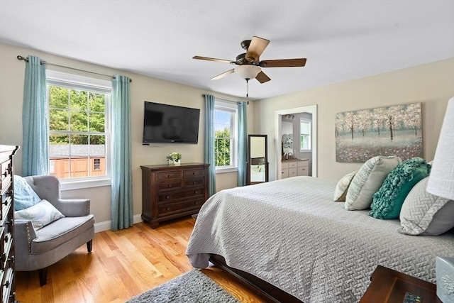 53 Gilbert Rd, Southampton, MA 01073 - bedroom with multiple windows, light wood finished floors, baseboards, and ceiling fan
