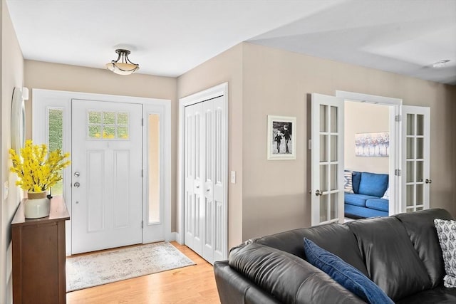 53 Gilbert Rd, Southampton, MA 01073 - entryway with light wood-style flooring and french doors