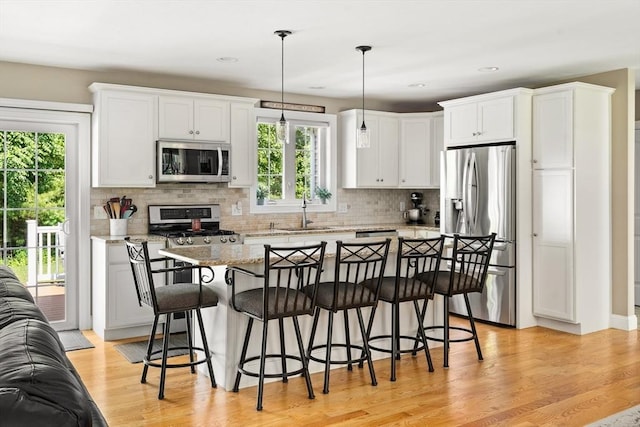 53 Gilbert Rd, Southampton, MA 01073 - kitchen featuring stainless steel appliances, a sink, plenty of natural light, decorative backsplash, and recessed lighting