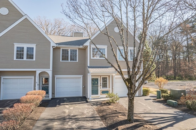 front facade with a garage