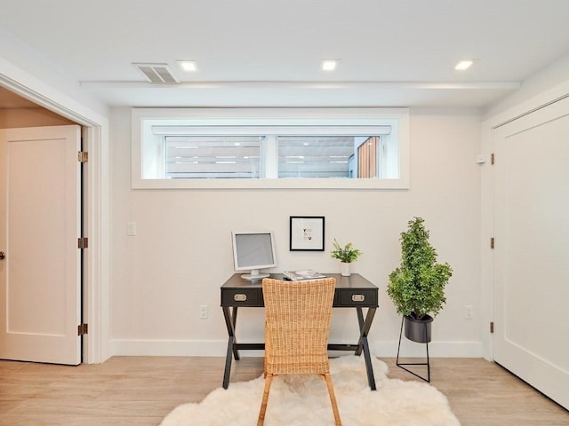 office with light wood-style floors, recessed lighting, visible vents, and baseboards