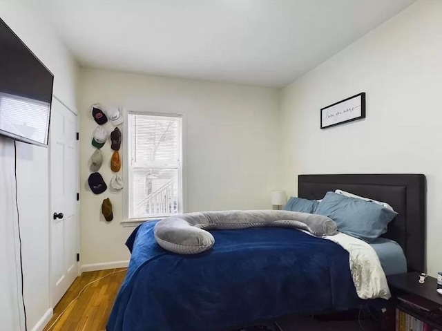 bedroom featuring hardwood / wood-style floors