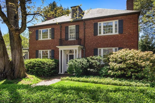 35 Jefferson Rd, Brookline, MA 02467 - view of front facade with a chimney and brick siding
