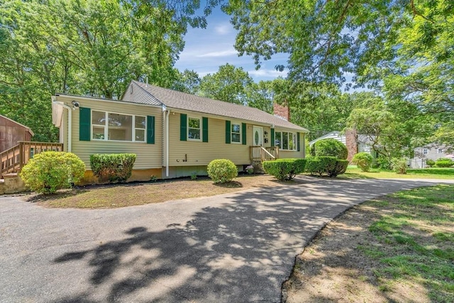 46 Curtis St, Brockton, MA 02301 - single story home with a chimney and driveway