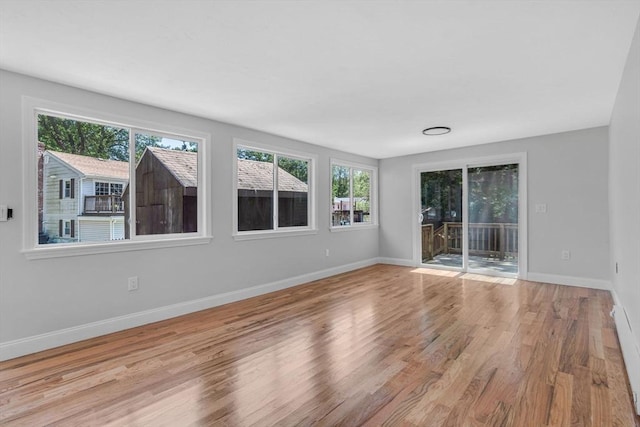 46 Curtis St, Brockton, MA 02301 - unfurnished room with wood finished floors and baseboards
