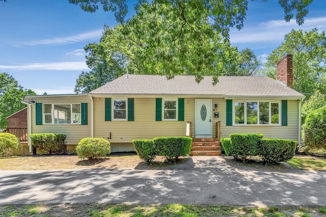 46 Curtis St, Brockton, MA 02301 - ranch-style house featuring a chimney and entry steps