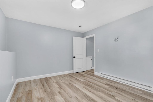 46 Curtis St, Brockton, MA 02301 - unfurnished room featuring baseboard heating and light wood-style flooring
