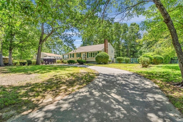 46 Curtis St, Brockton, MA 02301 - single story home featuring driveway and a chimney