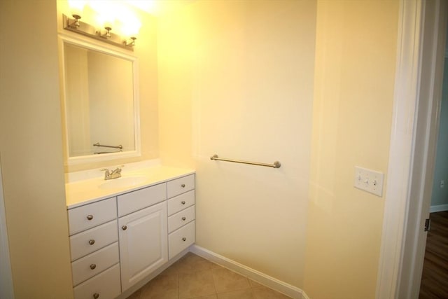 bathroom with vanity and tile patterned floors