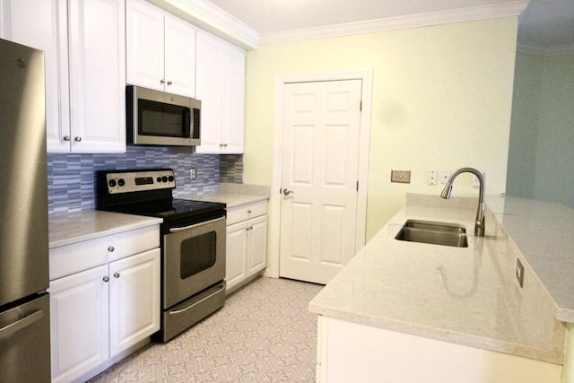 kitchen with white cabinetry, sink, and appliances with stainless steel finishes