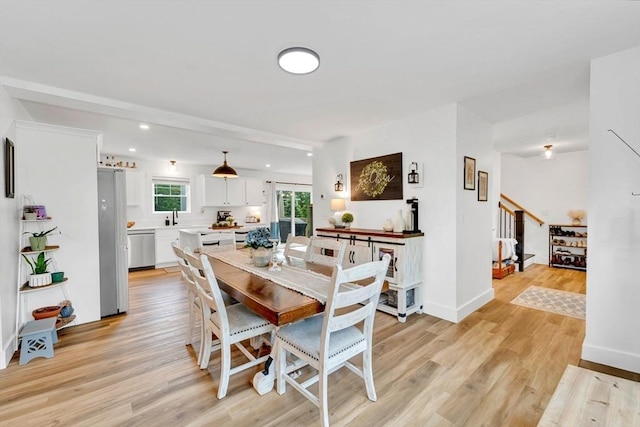 182 Sheldon Rd, Fitchburg, MA 01420 - dining room with stairway, light wood-style flooring, and recessed lighting