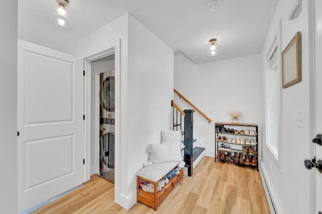 182 Sheldon Rd, Fitchburg, MA 01420 - entryway with stacked washer / dryer and light wood-type flooring