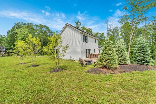 182 Sheldon Rd, Fitchburg, MA 01420 - view of side of property featuring a yard and a wooden deck