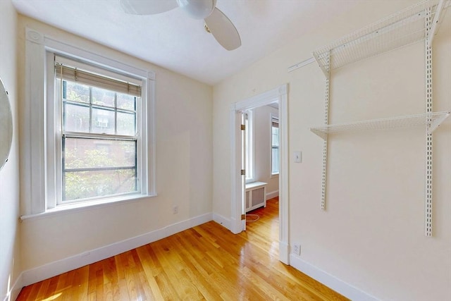 11 Irving St Unit 4, Boston, MA 02114 - spare room with baseboards, light wood-style flooring, and a ceiling fan