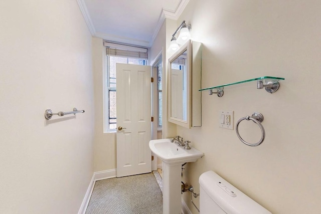 11 Irving St Unit 4, Boston, MA 02114 - half bath featuring crown molding, toilet, and baseboards
