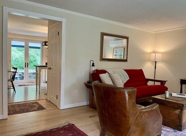 947 Burts Pit Rd, Northampton, MA 01062 - living area featuring light wood-style floors, ornamental molding, a wall unit AC, and french doors