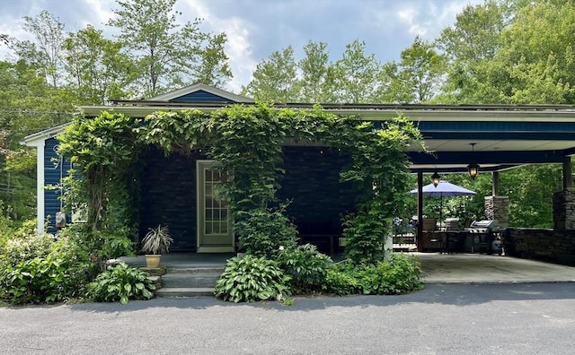 947 Burts Pit Rd, Northampton, MA 01062 - view of front of property with asphalt driveway and a carport