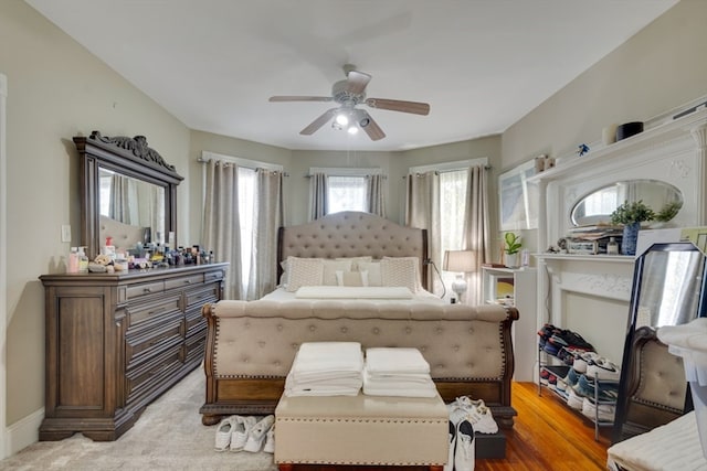 bedroom featuring ceiling fan and hardwood / wood-style floors