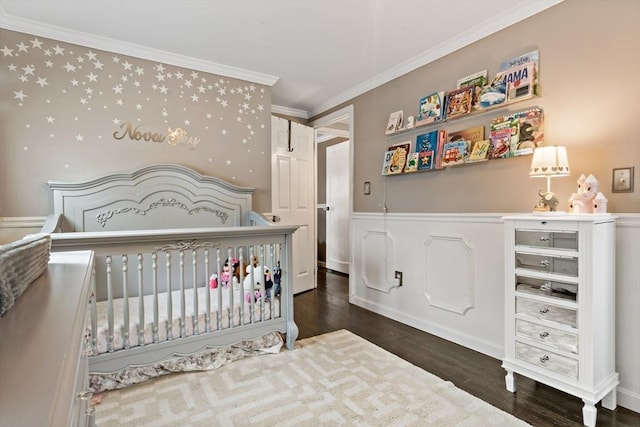 bedroom featuring dark hardwood / wood-style flooring and crown molding