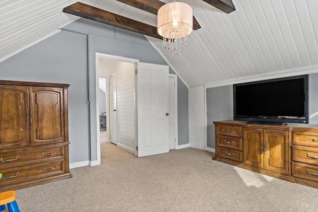 bonus room featuring light carpet and lofted ceiling with beams