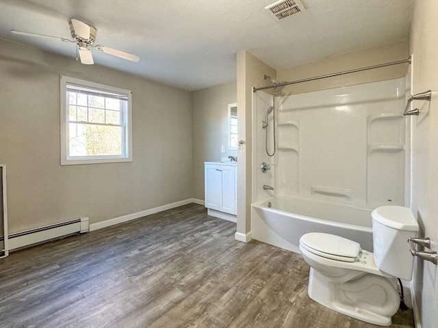 bathroom featuring shower / tub combination, wood-type flooring, a baseboard radiator, ceiling fan, and toilet