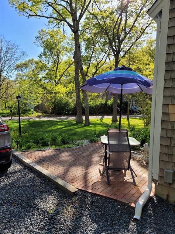 92 Santuit Pond Rd, Mashpee, MA 02649 - deck featuring a lawn