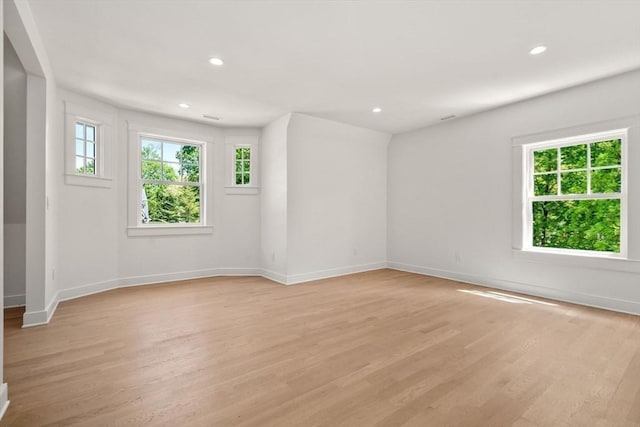 61 Westbourne Rd, Newton, MA 02459 - spare room featuring baseboards, light wood finished floors, and recessed lighting