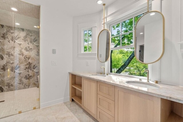 61 Westbourne Rd, Newton, MA 02459 - full bathroom with a stall shower, double vanity, baseboards, recessed lighting, and marble finish flooring