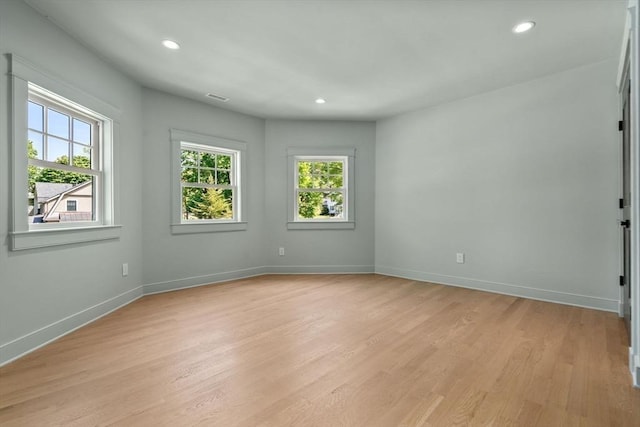 61 Westbourne Rd, Newton, MA 02459 - unfurnished room with light wood-style flooring, recessed lighting, and baseboards