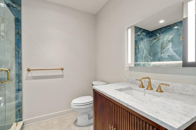61 Westbourne Rd, Newton, MA 02459 - full bath featuring toilet, vanity, a marble finish shower, baseboards, and recessed lighting