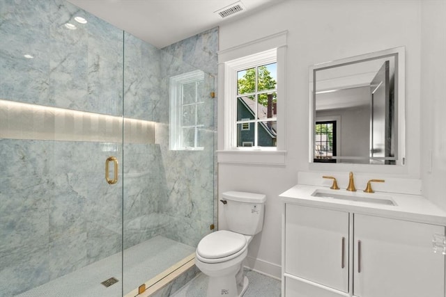 61 Westbourne Rd, Newton, MA 02459 - bathroom featuring toilet, vanity, a shower stall, and baseboards