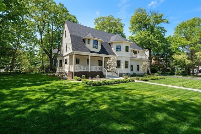 61 Westbourne Rd, Newton, MA 02459 - view of front of property featuring a porch, a front lawn, and roof with shingles