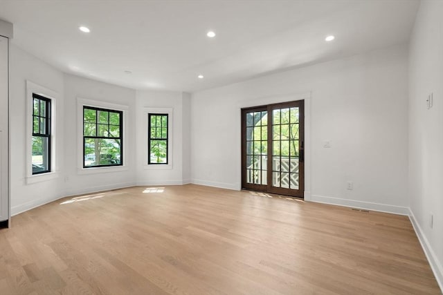 61 Westbourne Rd, Newton, MA 02459 - empty room featuring light wood finished floors, recessed lighting, and baseboards
