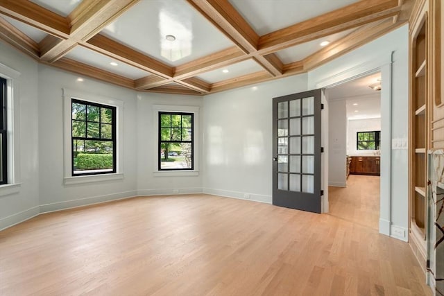 61 Westbourne Rd, Newton, MA 02459 - unfurnished room with light wood-style flooring, healthy amount of natural light, beamed ceiling, coffered ceiling, and baseboards