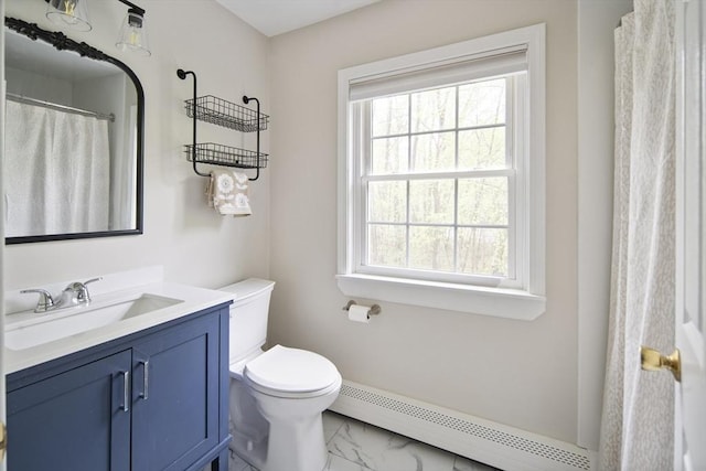bathroom with a baseboard heating unit, marble look tile flooring, vanity, and toilet