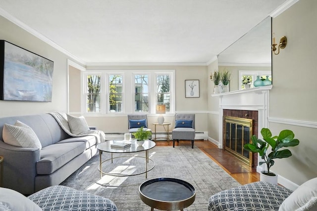 living room with ornamental molding, wood finished floors, baseboards, a baseboard heating unit, and a fireplace with flush hearth