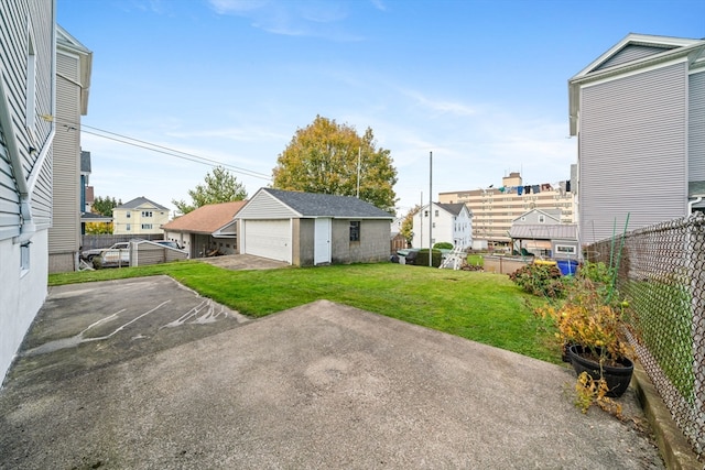 exterior space featuring an outbuilding and a garage