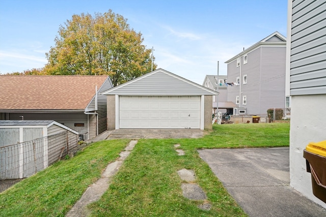 garage featuring a yard