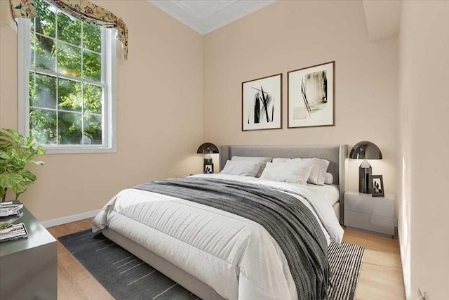 42 Phillips Rd Unit 1, Holden, MA 01520 - bedroom featuring multiple windows, wood finished floors, and baseboards