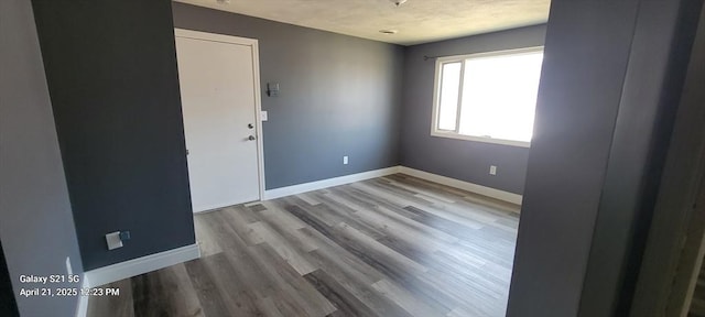 50 Clark St Unit 12, Fall River, MA 02720 - unfurnished room featuring baseboards and wood finished floors