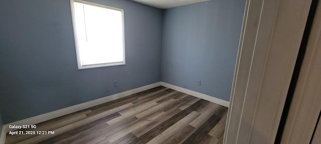 50 Clark St Unit 12, Fall River, MA 02720 - empty room featuring baseboards and dark wood-style flooring