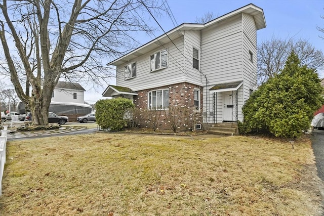 10 Gleason Rd, Shrewsbury, MA 01545 - view of front of house featuring brick siding and a front lawn