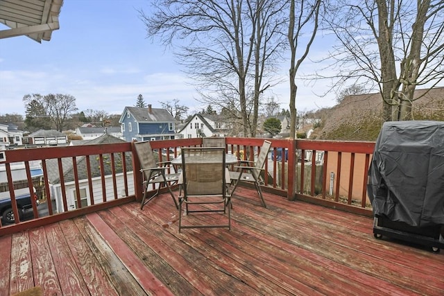 10 Gleason Rd, Shrewsbury, MA 01545 - deck featuring outdoor dining space, grilling area, and a residential view