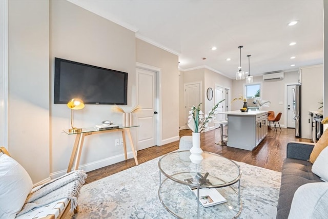 living room featuring a wall mounted air conditioner, dark hardwood / wood-style flooring, and ornamental molding