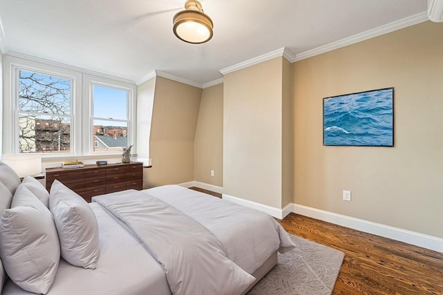 bedroom featuring hardwood / wood-style floors and ornamental molding