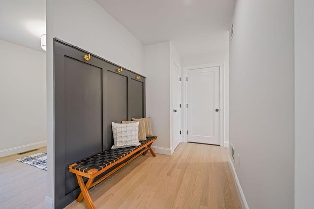13 Nantucket Dr, Mattapoisett, MA 02719 - mudroom with light wood-style flooring and baseboards