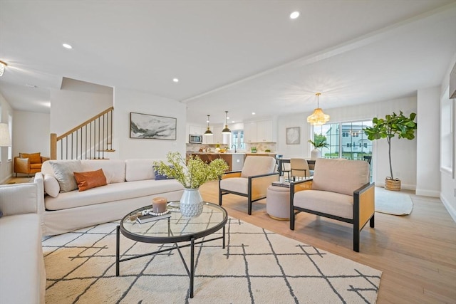 13 Nantucket Dr, Mattapoisett, MA 02719 - living room with light wood-type flooring, stairs, recessed lighting, and baseboards